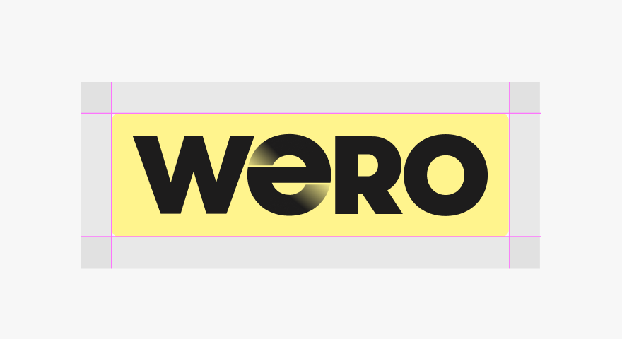 A close-up technical view of the Wero logo spacing, showing the pink alignment guides and gray padding zones.